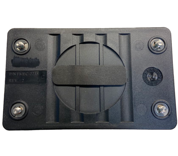 A black plastic device with four metal plates.