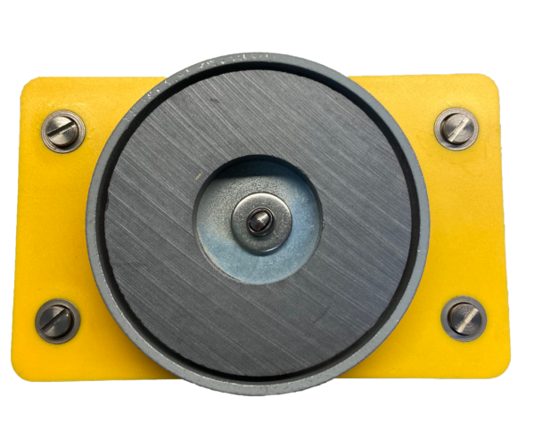 A yellow and black object with a metal disc.