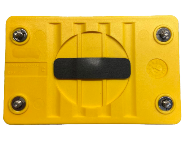 A yellow plastic object with black strip on it.