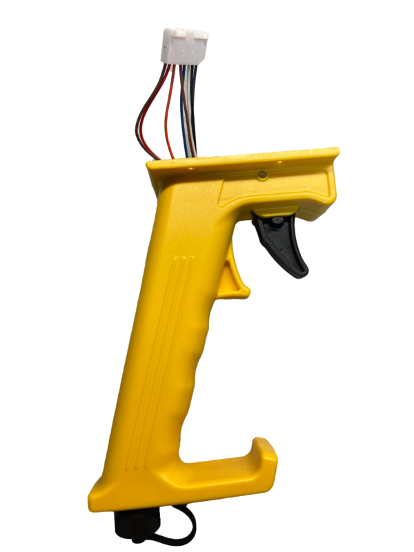 A yellow plastic gun with wires attached to it.